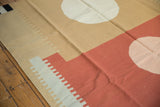 Terracotta and beige contemporary Kilim rug with serrated rectangular and roundel motifs.