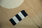Handwoven Contemporary Kilim corner, jet black and ivory stripes on beige.