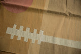 Handwoven ivory and dark gold rectangular pillar motif on the contemporary Kilim.