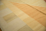 Hand woven kilim texture with modern geometric shapes and soft color abrashes.