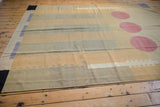 Intact side cord selvage of a vintage hand woven contemporary Kilim rug, showing black and blue patterns.