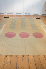 Beige and sand hand-woven flatweave texture of the Contemporary Kilim carpet's original edge.