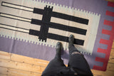 Vintage Contemporary Kilim runner, abstract black, ivory, lavender, and red staggered pattern.
