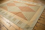 Contemporary hand woven Kilim rug corner with geometric argyle pattern, featuring intact selvage.