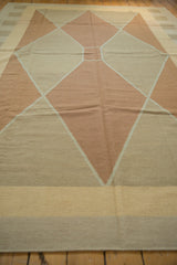 Modern Argyle diamond pattern in copper, beige, and cream on vintage Kilim.