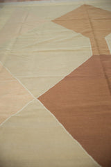 Modern Argyle-inspired kilim rug with copper brown and ivory geometric pattern.