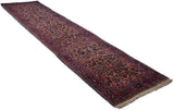 Cherry red border with intricate palmettes, botehs, and vinery on a dark beige Meshed runner.