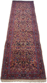 Vintage Persian Meshed rug end, with fringe and red border framing delicate floral vinery.