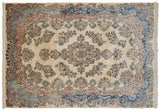 The even pile and original side cord selvages of the vintage Persian Kerman carpet.