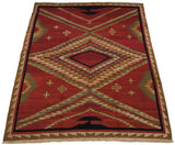Vintage Indian Soumac design carpet, displaying serrated geometric motifs, red field, and side selvage.