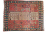 Vintage Indian Qashqai Soumac carpet featuring a multi-paneled pictorial design in terracotta, ivory, and dusty green.