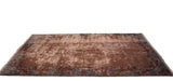 Vintage Indian Arts and Crafts carpet, angled view of plush beige field, blue and red floral border.