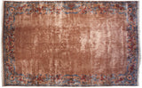 Plush vintage Indian Arts and Crafts rug with ornate blue and red floral borders.