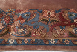 Plush pile Indian Arts and Crafts border with floral arabesques, palmettes in blue, red, and ecru.