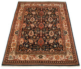Vintage Agra carpet corner, displaying madder red florals, vinery, and arabesque motifs.
