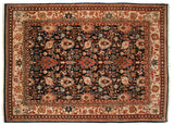 Vintage Agra carpet, navy blue field with splayed floral motifs, light border with dragon-style arabesques. 9' x 12'4