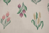 Hand woven Romanian Kilim rug detail featuring blush blossoms, mauve flowers, and wheat.