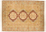 Vintage Bulgarian carpet with a triple medallion in wine red and sky blue on a dusty gold field.