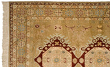 Corner of a vintage Bulgarian carpet showing plush pile, geometric pinwheel borders, and ivory fringe.