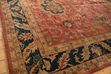 Plush corner of a vintage Agra carpet with a navy blue serrated leaf and palmette border.