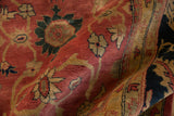 Lush, hand-knotted wool pile of a vintage Agra carpet in copper and saffron yellow.
