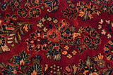 Intricate floral sprays and full, even pile of a vintage American Sarouk carpet.