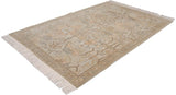 Detailed corner of the Armenian Sultanabad rug, with ivory, beige, and peach floral vinery.