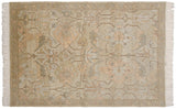 Armenian Sultanabad rug displaying oversized floral motifs, scrolling leaves, and a narrow banded border.