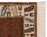 Armenian rug corner showing deep copper tone-on-tone field with buds and serrated leaf border.