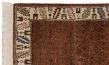 Armenian rug fringe and corner detail, deep copper lattice field and serrated leaf border.