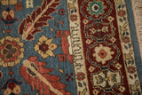Weaver's insignia woven into the inner border of a vintage Armenian Veramin design runner.