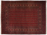 Fine vintage Pakistani Bokhara carpet with repeating gul medallions in black cherry red and navy blue.