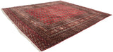 Cherry red gul medallions and detailed geometric borders on a vintage Bokhara carpet.