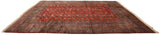 High sheen and luster across the traditional gul medallions of a vintage Bokhara carpet.
