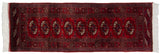 Cherry red gul medallions and intricate borders on a vintage Bokhara rug.