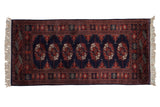 Fine Vintage Bokhara runner, navy blue and rust repeating gul medallions, plush pile, 2'4