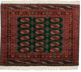 The back of a finely knotted Bokhara rug showing the clear gul pattern and foundation.