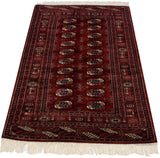 A fine Pakistani Bokhara rug highlighting its plush, silk-like wool pile and classic gul design.