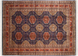 Vintage Pakistani carpet with a Caucasian design of rust and beige medallions on an indigo blue field.