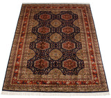High sheen on the plush wool pile of a vintage Pakistani rug with rows of geometric medallions.