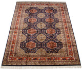The lustrous, silk-like pile of a vintage Pakistani rug with a geometric Caucasian design.