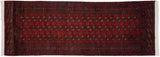 Full view of a vintage Bokhara runner's repeating gul medallions and detailed ornamental borders.