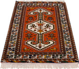 Intact side selvage, geometric Persian border, and rust field with animal motifs.