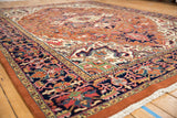 Detailed vintage Indian Heriz carpet border in navy, rust, and ivory with floral vinery.