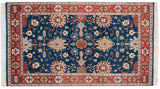 Vintage Indian Bijar design rug with large palmettes and sprawling vines on a sapphire blue field.