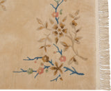 Plush ivory pile with ornate blush and blue Art Deco foliage, original fringe, and selvage.