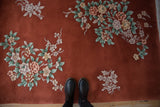 Vintage Chinese Art Deco rug, copper field with lush celadon green and dusty rose floral sprays.