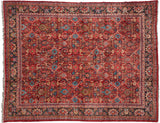 Herati-style floral lattice in gem tones of turquoise and blue on a vintage Mahal carpet.