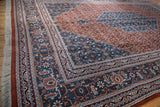 Vintage Indian Bijar carpet side, showcasing denim blue Herati field and patterned rust border.