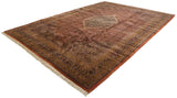 Vintage Indian Bijar carpet: diamond medallion and Herati motif in copper, navy, dusty gold.